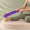 StretchBand ouvert utilisé pour étirer l’arrière de la jambe